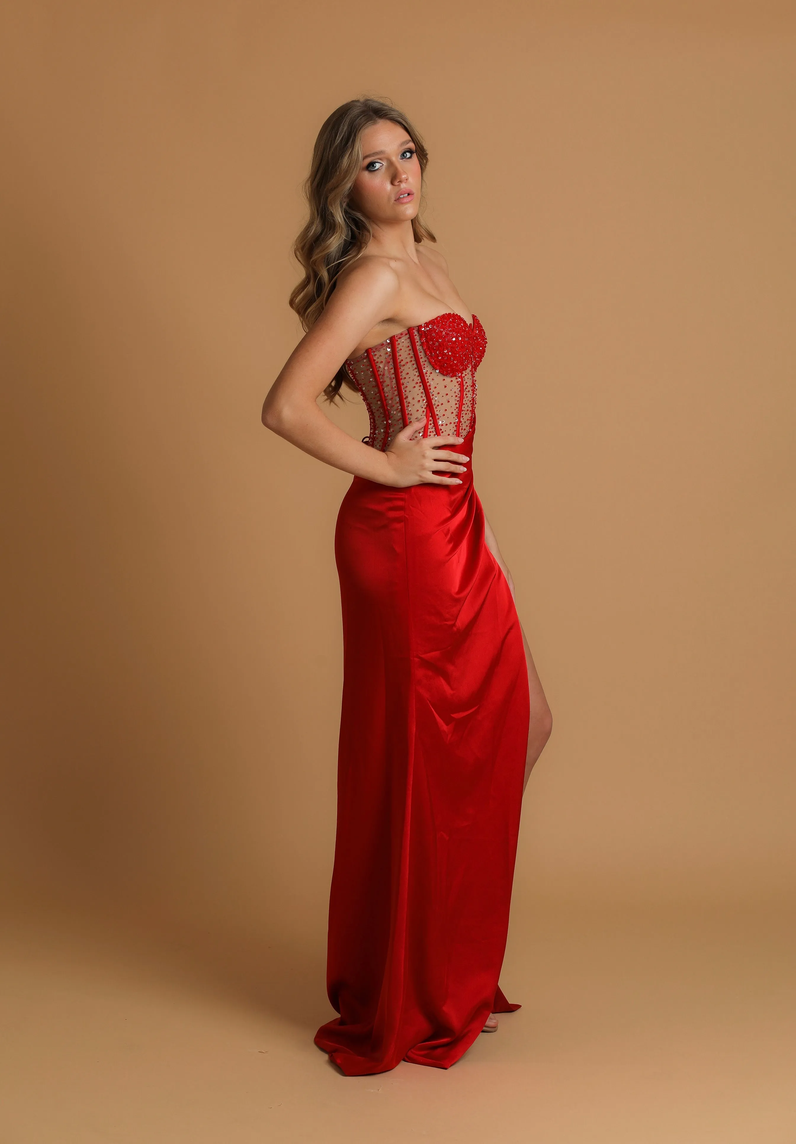 Red corset dress with high slit