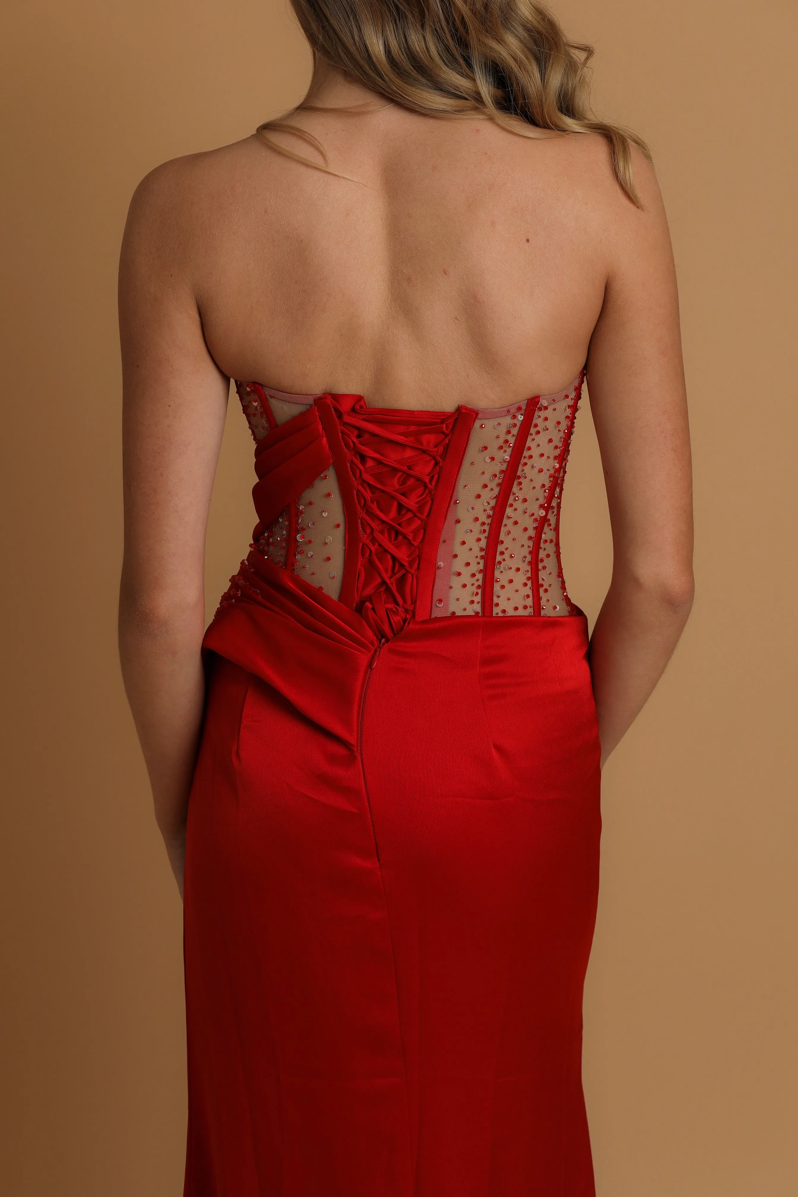 Red corset dress with high slit